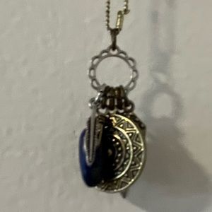 American Eagle Long Multi-Charm Blue, Gold, and  Silver Necklace